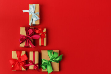 Gifts packed with craft paper and colorful satin ribbons