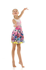 Cute Smiling Girl Standing and Looking at the Camera