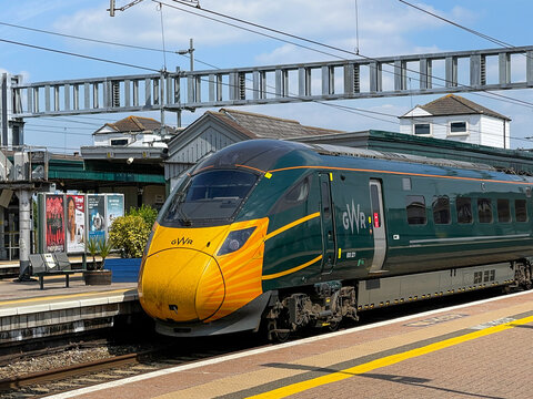 Didcot, England - June 2021: Class 800 high speed train operated by Great Western Railway at Dicot railway station. The front of the locomotive has been painted with a Covid mask.