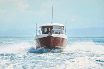 Fast boat on wavy blue sea. luxury motor boat in navigation
