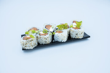 Japanese food on black dish with white background
