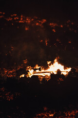 Fototapeta na wymiar Skateboard in fire of lava
