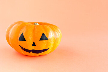 Happy Halloween decoration on orange background. Halloween Pumpkin.