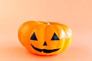 Happy Halloween decoration on orange background. Halloween Pumpkin.