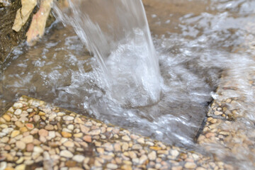 water flowing into water