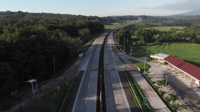 8.	Video from a flying drone, highway road on a sunny day in summer Salatiga Central Java Indonesia.