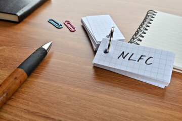 There is a card with the word of NLFC which is an abbreviation for National Life Finance...