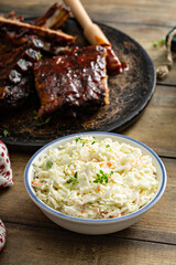 Coleslaw salad served with BBQ meal, traditional side