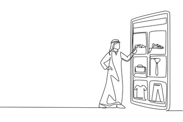 Single continuous line drawing young Arabian man choosing shopping items on a giant smartphone screen. Digital lifestyle with gadgets concept. Dynamic one line draw graphic design vector illustration