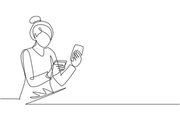 Single one line drawing young man typing entering credit card code on smartphone. Online store, e-commerce, digital payment concept. Modern continuous line draw design graphic vector illustration