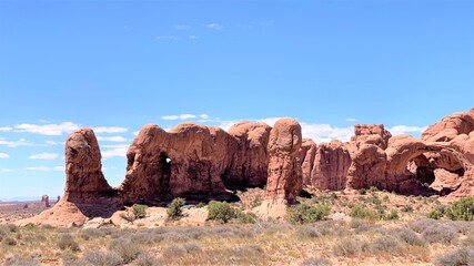 Fototapeta na wymiar A Beautiful Panoramic of the Desert Rock Formations in Arches National Park Near Moab, Utah 