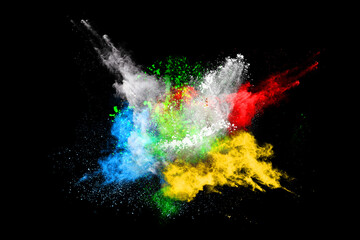 abstract colored dust explosion on a black background.abstract powder splatted background,Freeze motion of color powder exploding/throwing color powder, multicolored glitter texture.