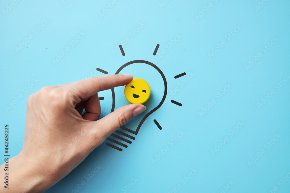 Poster a yellow circle with a smile pattern in the light bulb. a symbol of creative ideas and problem solvi