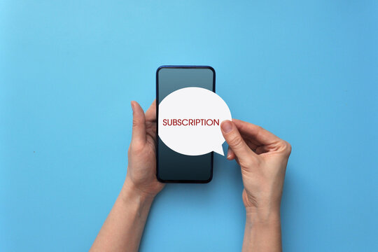 A person with a phone in his hands signed up for a subscription
