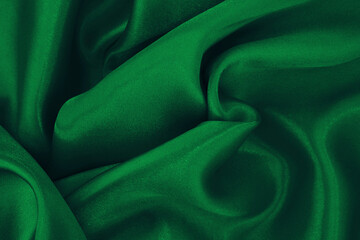 Dark green fabric flying texture background, detail of silk or linen pattern.