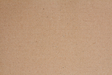 Cardboard sheet texture background, detail of recycle brown paper box pattern.