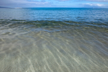 Beach and tropical sea background. Concept of summer relaxation.