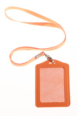 Blank badge mockup color orange isolated on white. Plain empty name tag mock up hanging on neck with string, name Tag.