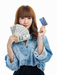 Woman holds American banknotes and credit card..