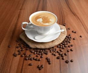 Obraz premium hot cafe latte drink with fresh milk in beautiful England white cup hot coffee beverage menu