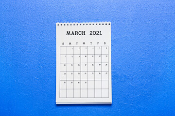 Flip paper calendar on color background