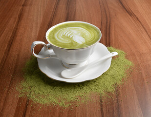 hot japanese matcha green tea latte drink with fresh milk in beautiful England white cup hot coffee beverage menu