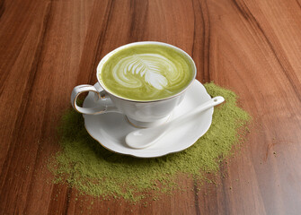 hot japanese matcha green tea latte drink with fresh milk in beautiful England white cup hot coffee beverage menu