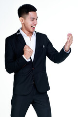 funny cutout portrait of smart young healthy businessman on black suit happily standing with clenched fist as satisfy on special promotion offering on bare palm