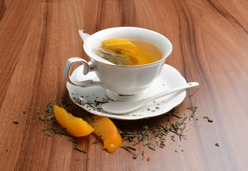 hot melon and peach fruit tea bag drink in beautiful England design white cup hot healthy beverage menu