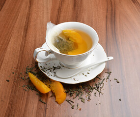 hot melon and peach fruit tea bag drink in beautiful England design white cup hot healthy beverage menu