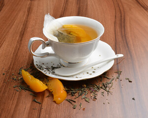 hot melon and peach fruit tea bag drink in beautiful England design white cup hot healthy beverage menu