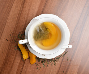 hot melon and peach fruit tea bag drink in beautiful England design white cup hot healthy beverage menu