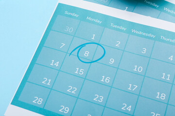 Fototapeta na wymiar Calendar with marked date on color background, closeup