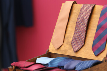 Box with stylish neckties, closeup