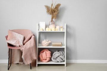 Interior of stylish living room with modern shelf unit