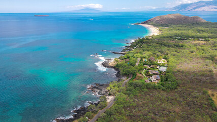 Fototapeta na wymiar Makena, Hawaii on the island of Maui. Hawaiian Real Estate with the Molokini Crater in the distance. 