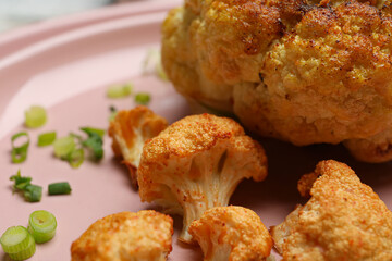 Plate with tasty fried cauliflower, closeup