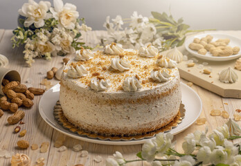 Cake with whipped cream and nuts