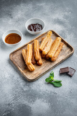 Typical Spanish snack  churros, fried-dough pastry served  usually with chocolate caramel hot...