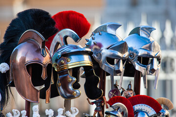 Roman soldier and gladiator helmets for sale on the streets of Roma, Italy