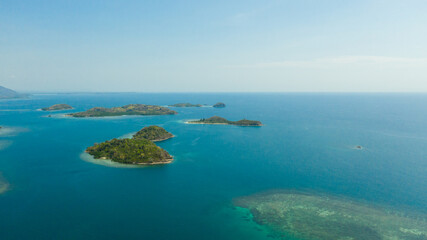 Plakat Islands with a sandy beaches and azure water. Lambang Island, Buguias Island. Zamboanga, Mindanao, Philippines.