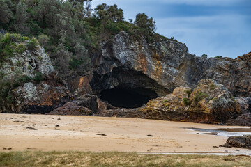 A winters day at Mystery Bay with a beach sea cave