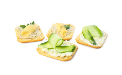 Delicious crackers with humus and cheese on white background
