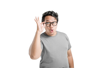 Naklejka premium Asian man in eyeglasses with excited expression