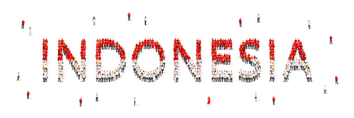 A crowd of people are standing in white and red robes, making up the word Indonesia. Indonesia flag made from people.