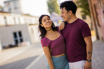 Naklejka premium Couple standing on street.
