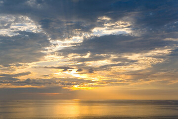 Naklejka na ściany i meble Seascape with beautiful colorful sunset and clouds.