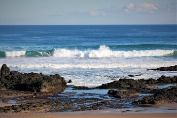 Fototapeta na wymiar Waves crashing on rocks. Phillip Island. Victotria. Australia 