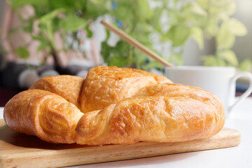 Breakfast with delicious croissants in the garden.