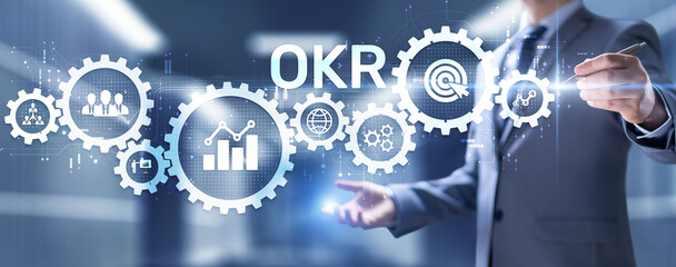OKR Objective key result business finance concept on screen.